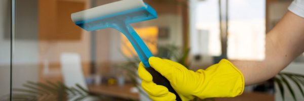 professional-cleaning-service-person-cleaning-office-window_23-2150520638